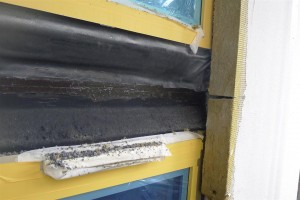 membrane and goop between units -- note mineral wool insulation
